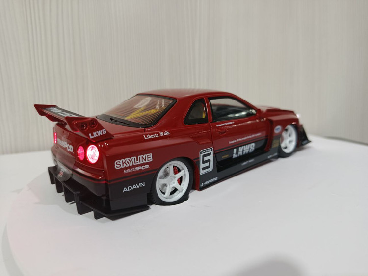 ماکت فلزی نیسان اسکایلاین GTR R34 مدل Liberty Walk | مقیاس 1:24 با صدا و چراغ